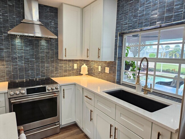 Building Photo - Annual Rental or 6+ month option - FURNISHED HEATED POOL HOME. Gorgeous 3 Bedroom, 3 Bath, 2 Car ...