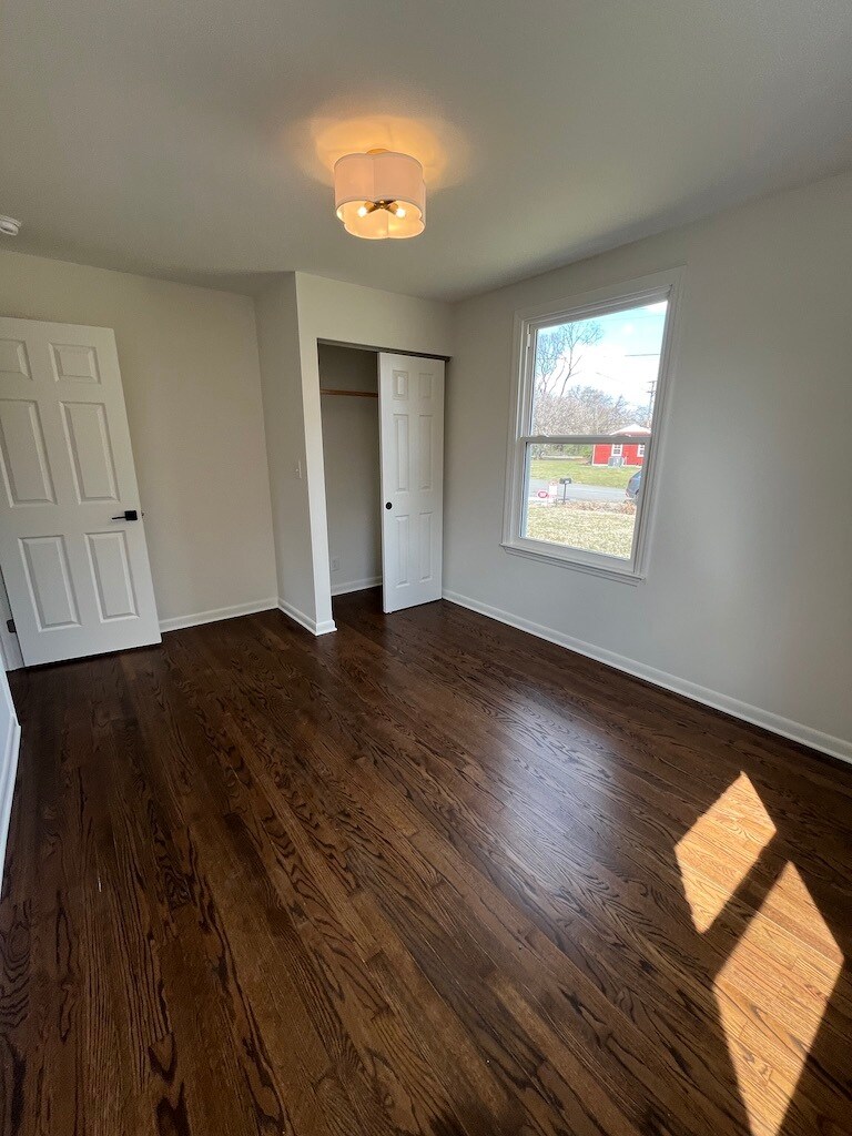 One of three bedrooms. - 623 Dunston Dr