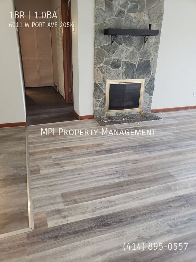 Building Photo - 6011 W Port Ave