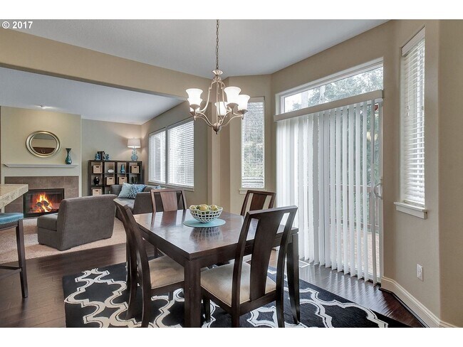 Building Photo - Bright and Open Floor Plan with Fireplace, Attached Garage & Vaulted Ceilings