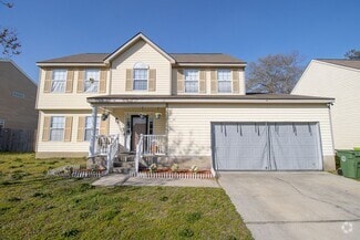 Building Photo - 4 Bedroom, 2.5 Bath in the sought after Su...