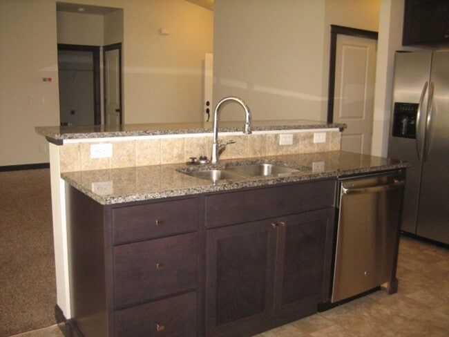 Building Photo - CDA Home w/ 22X45 RV Garage/Shop!