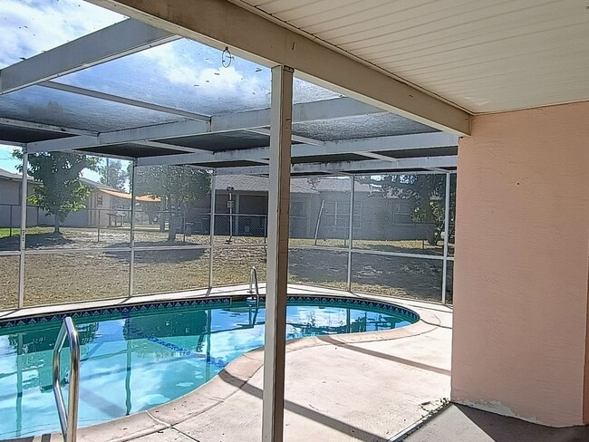 Building Photo - Pool. Privacy. Perfect location. Available now!