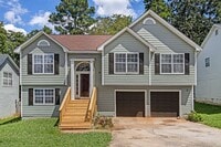Building Photo - Rare Find: 4 Bedroom + 3 Bathroom + 2-Car ...