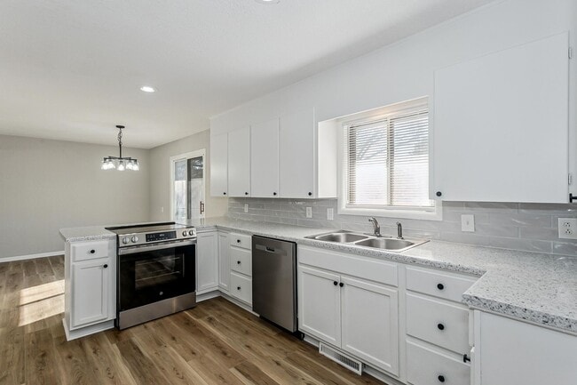 Building Photo - Beautifully Remodeled 4-Bedroom Home with 4+ Car Garage!