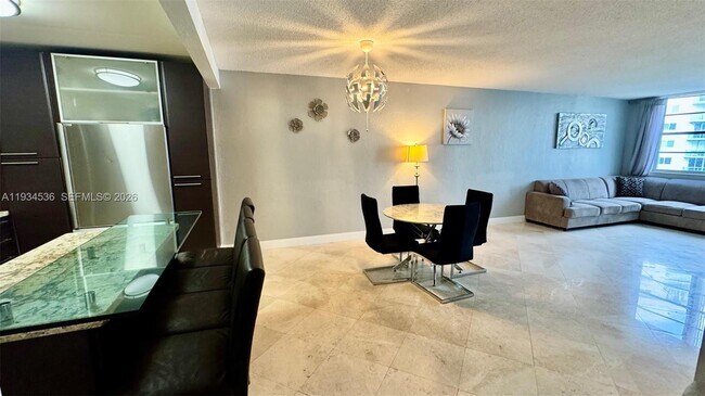 Building Photo - 19390 Collins Ave