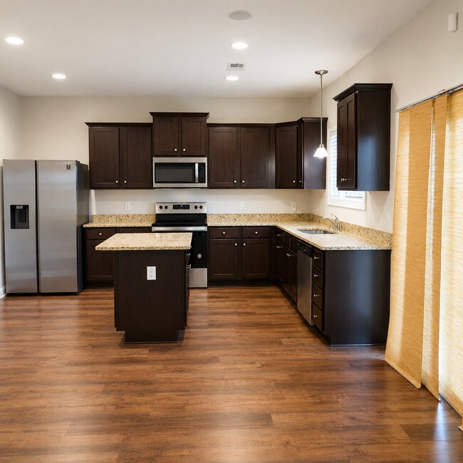 Building Photo - 4BR Home with Community Pool & Modern Finishes!