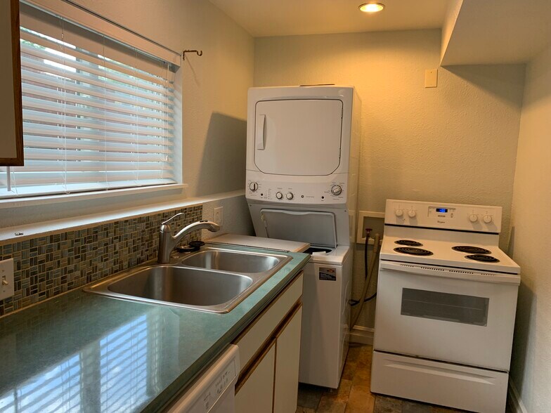 Included dishwasher, stove, microwave, washer & dryer - 4135 NW Carlton Ct