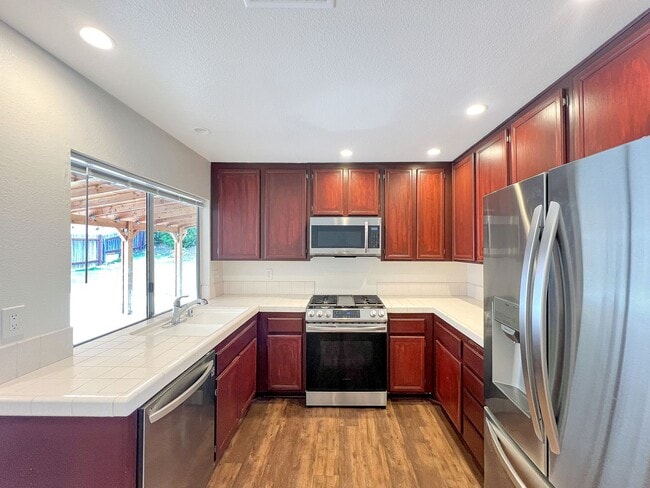 Building Photo - Charming 3B/2BA Home in Bay Terraces W/ W/D, A/C, Fireplace, Covered Patio, and Large Backyard!