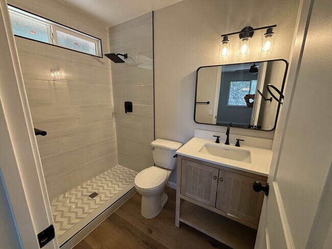 Building Photo - Fully remodeled home nestled on a spacious...