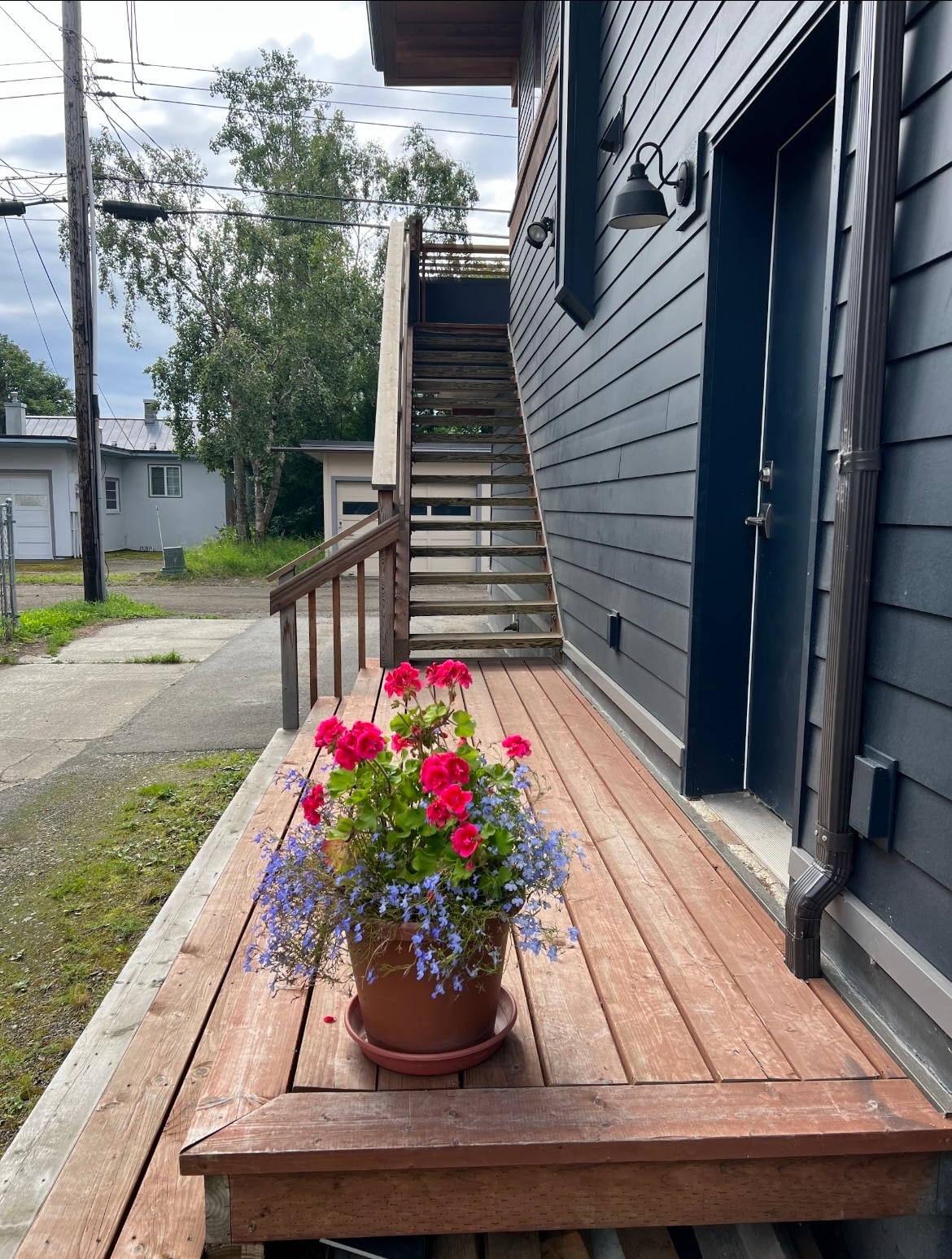 Private entryway to unit, parking under the stairs - 1019 N St