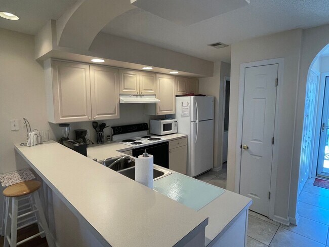 Building Photo - Four-month rental - Furnished Two Bedroom Condo at Eastport on Waterway!