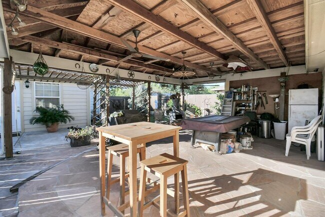 Patio areas pool table and chairs included - 5219 San Pablo Gardens Dr