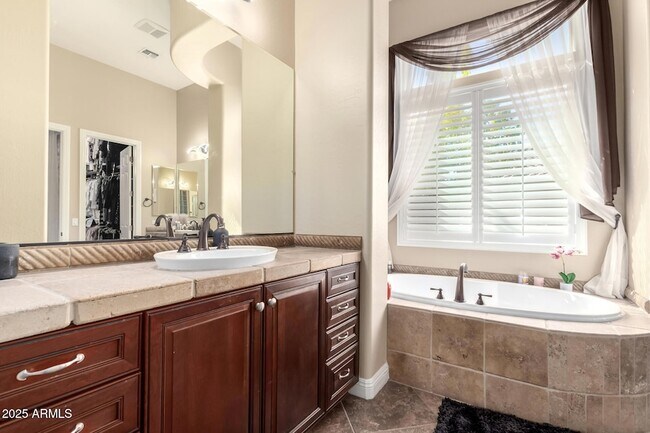 Building Photo - 4935 W Yearling Rd