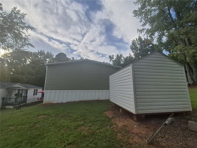 Building Photo - 6017 Whispering Pines