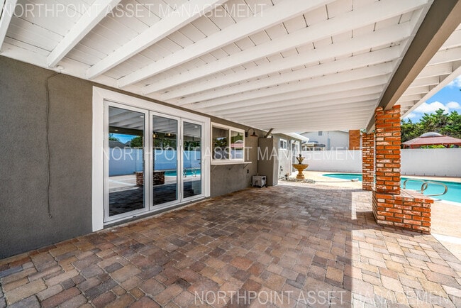 Building Photo - Brand New Remodel – Stunning Pool Home wit...