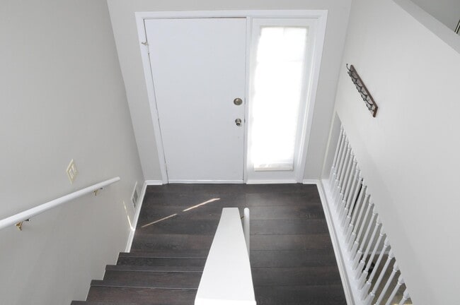 Front door, stairway downstairs - 152 Farm Gate Ln