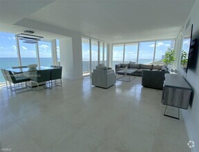 Building Photo - 2 br, 2.5 bath Condo - 10275 Collins Ave A...