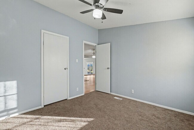 Building Photo - 3-Bed Home with Fireplace, Fenced Yard & Flexible Living Space