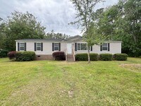 Building Photo - AVAILABLE NOW | SMALL PETS PERMITTED | LAR...
