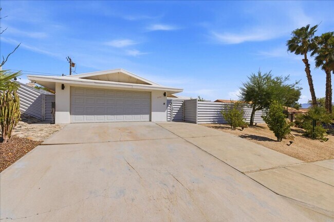 Building Photo - 3 bed / 2 Bath Mid-Century Home with Two-Car Garage, Soaking Pool and Manicured Backyard!
