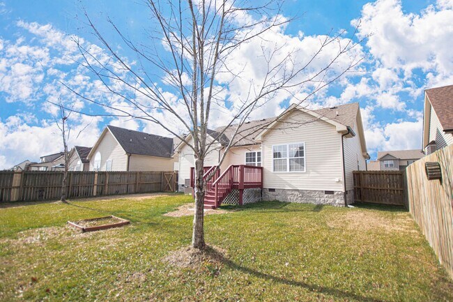 Building Photo - Pet Friendly Three Bedroom with Bonus!