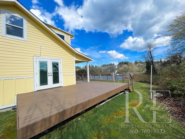 Building Photo - Whimsical Craftsman with Wraparound Porch, Bonus Room & Liberty Bay Peek Views