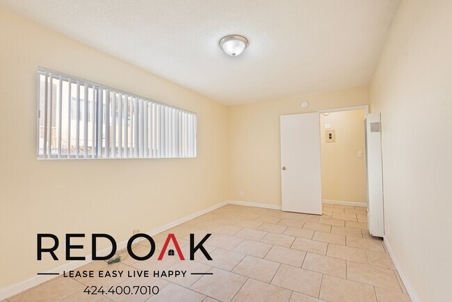 Building Photo - Spacious Two Bedroom with Tile Floors, Lar...