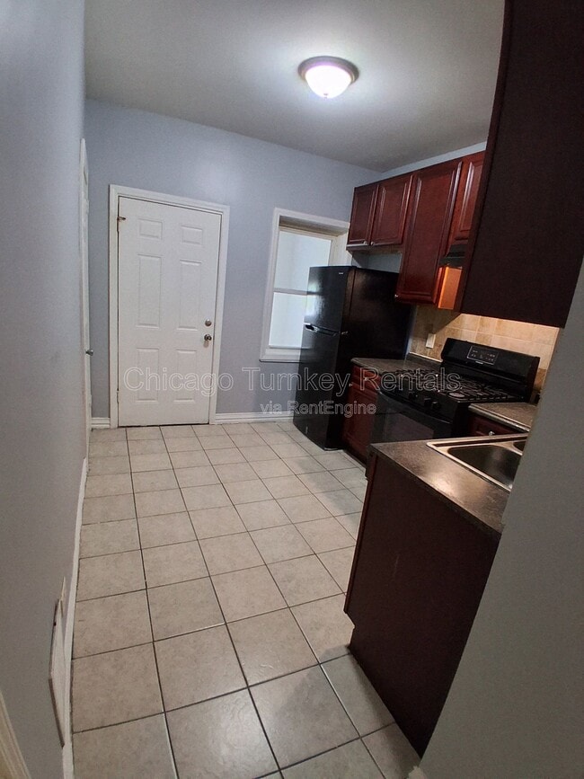 Building Photo - 7125 S Ellis Ave