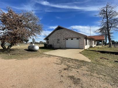 Building Photo - "Charming 3-Bed Oasis on US Highway 87: Sp...