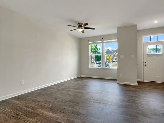 Building Photo - Move-In Ready Townhome with Finished Basem...