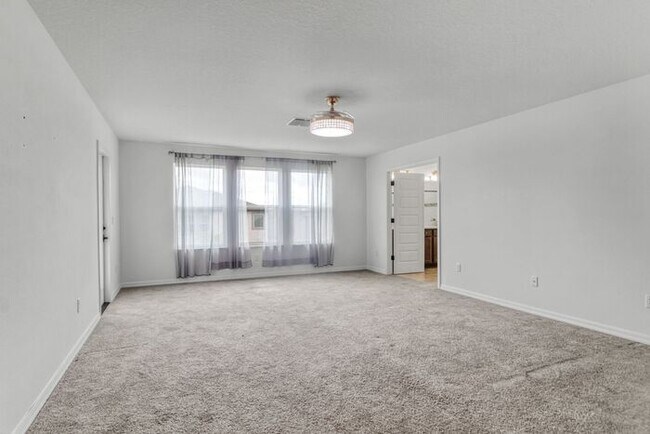 Building Photo - Discover luxury living in the gated Whispe...