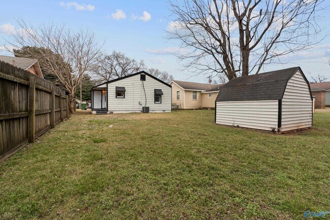 Building Photo - 1306 Oshaughnessy Ave NE