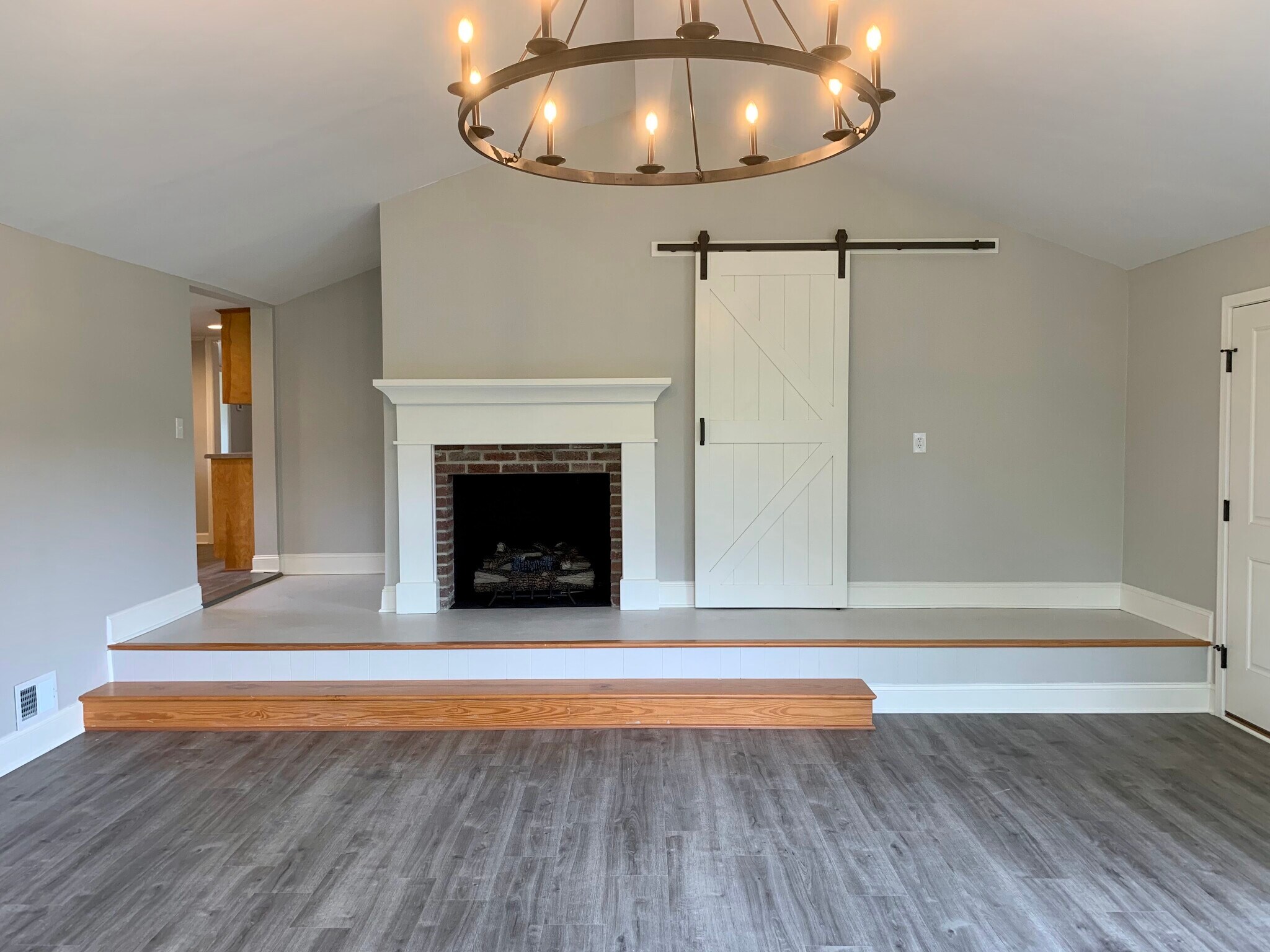 Family Room with Gas Fireplace (Storage closet behind barn door) - 250 Bailey Mill Rd