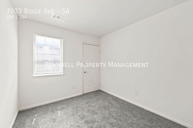 Building Photo - 7033 Ridge Ave