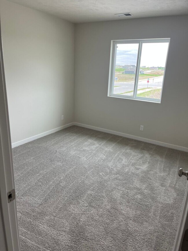 Building Photo - Spacious 5-Bedroom Duplex Near Asbury Elementary with Finished Basement & Full Amenities