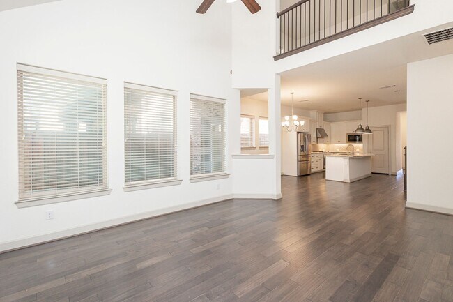 Building Photo - This house offers beautiful open floor plan with high ceilings and lots of natural light.