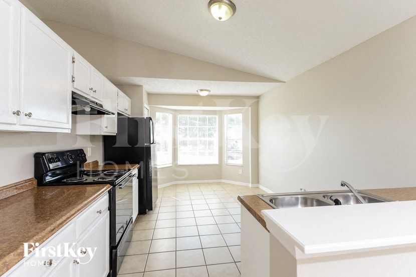 Building Photo - 7547 Groveoak Dr