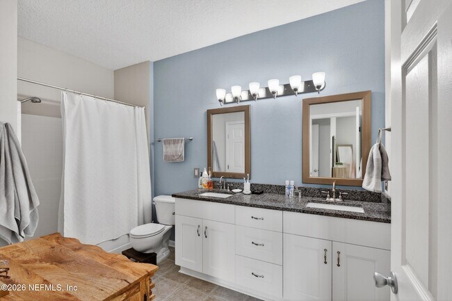 Building Photo - 7801 Point Meadows Dr