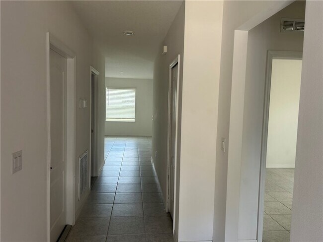 Building Photo - 8616 100th Ct