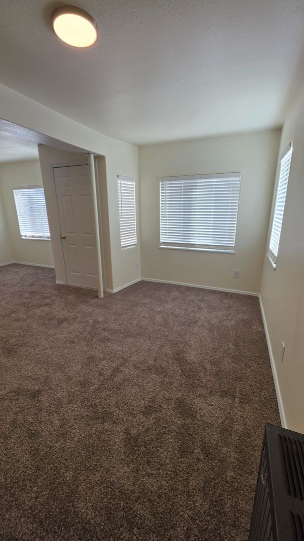 Building Photo - $1111 | 1BR/1BA | Cozy Lower Duplex Unit i...