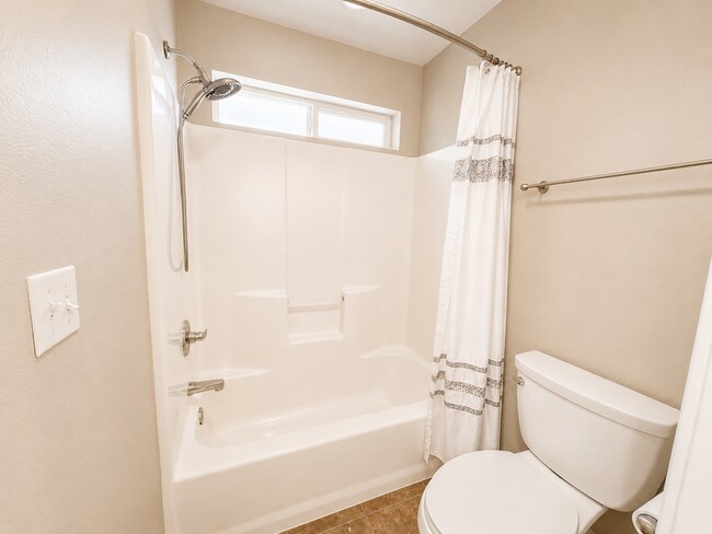 Building Photo - Light-Filled 3 Bedroom Retreat with Waterfall & Fully Fenced Yard