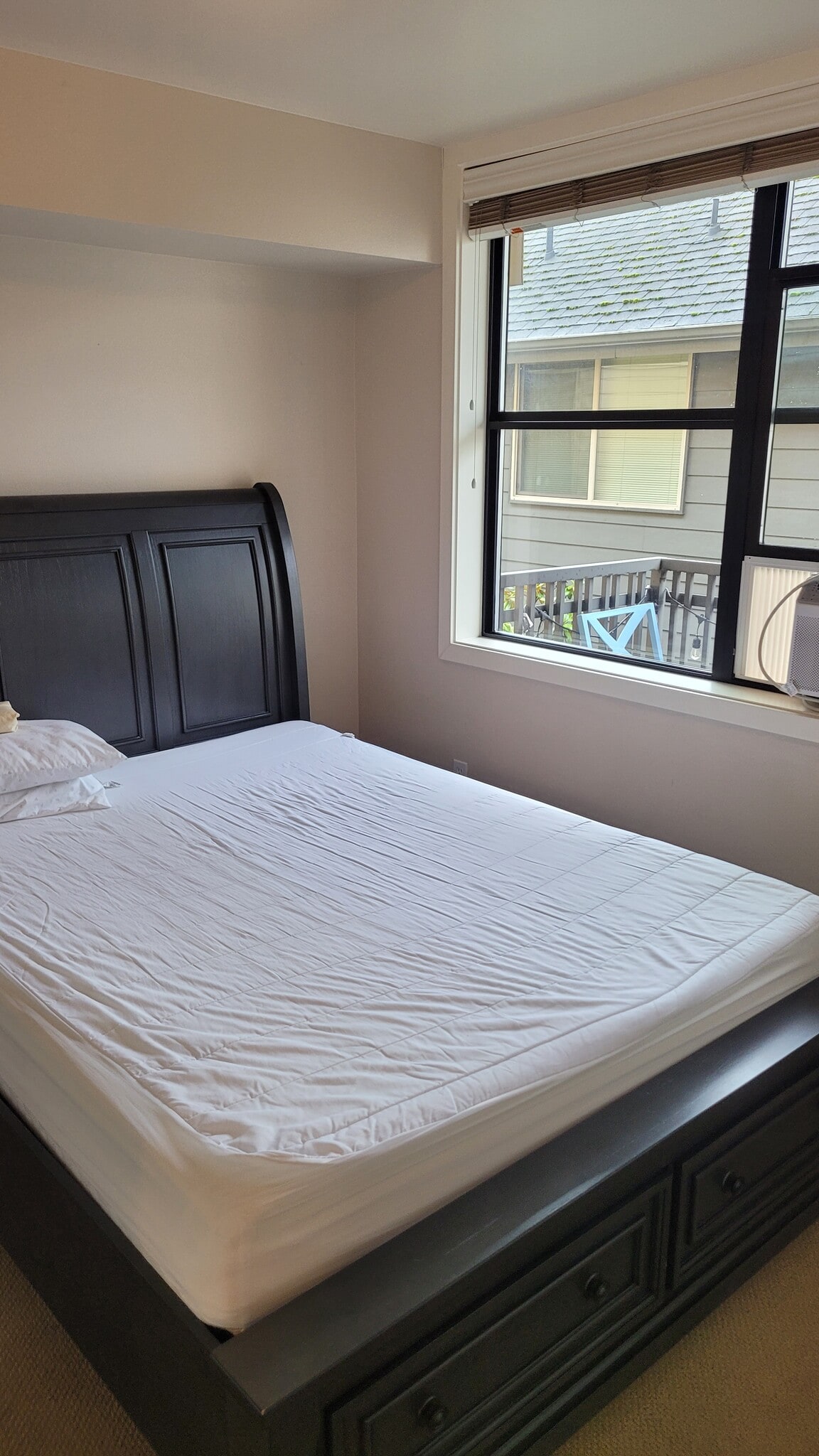 queen sized bed in bedroom - 4116 California Ave SW