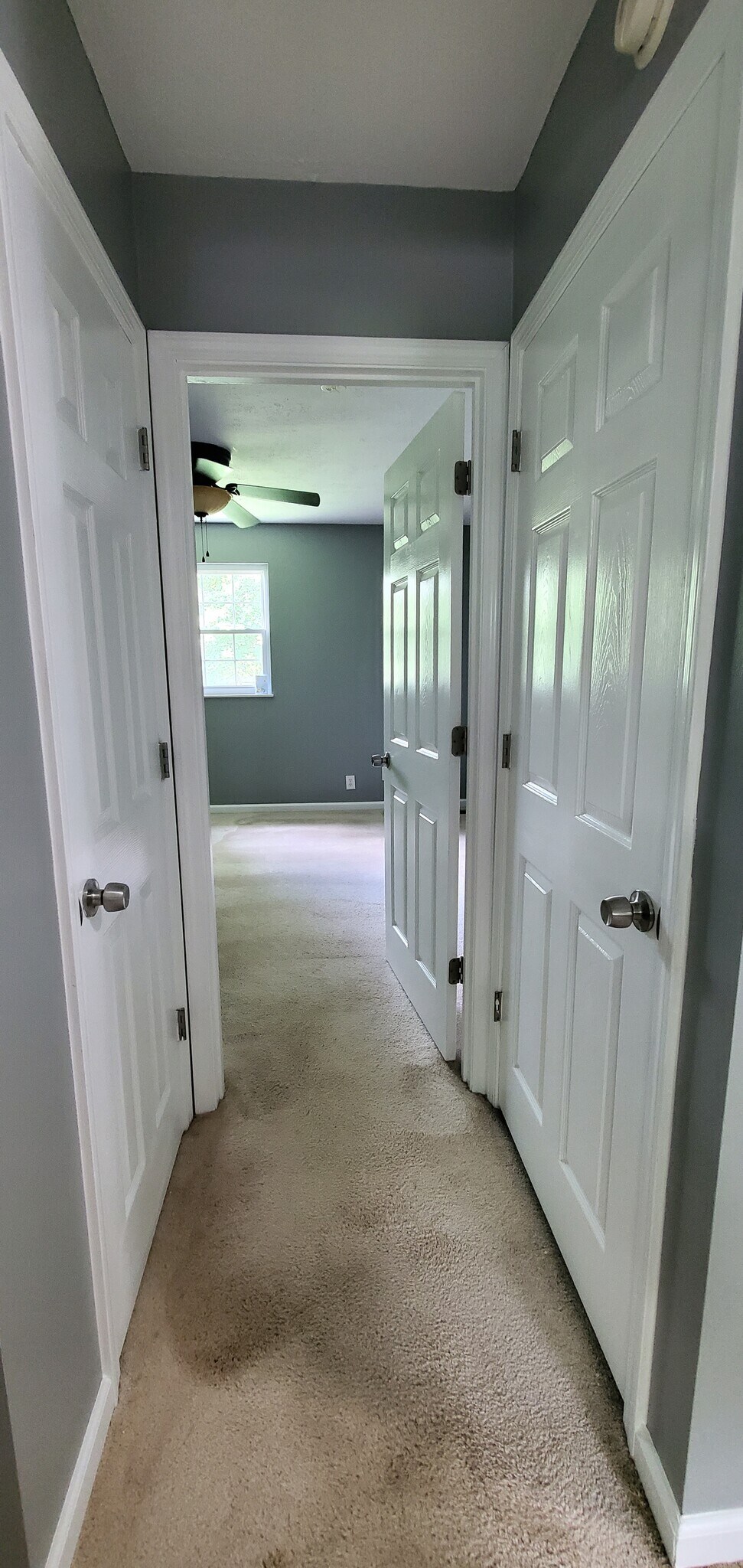 Master bedroom entry across from bedroom #2. Closet on right is utility closet, left has storage - 313 Britanna Dr