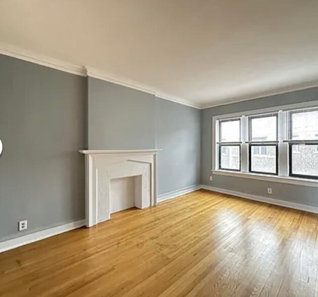 Building Photo - 1321 W Estes Ave