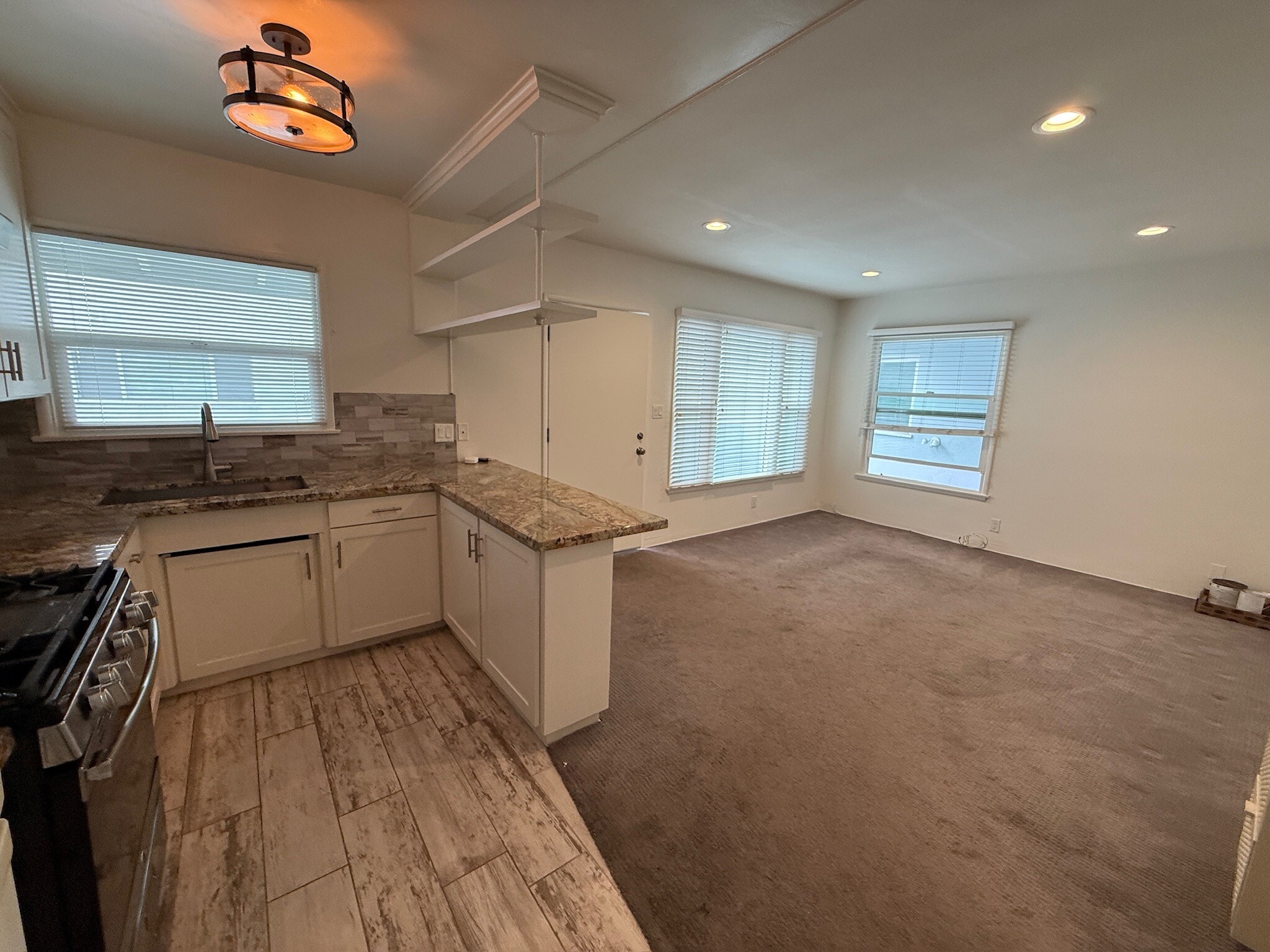 Open Kitchen to Living Room with Granite Breakfast Bar - 811 S Catalina Ave