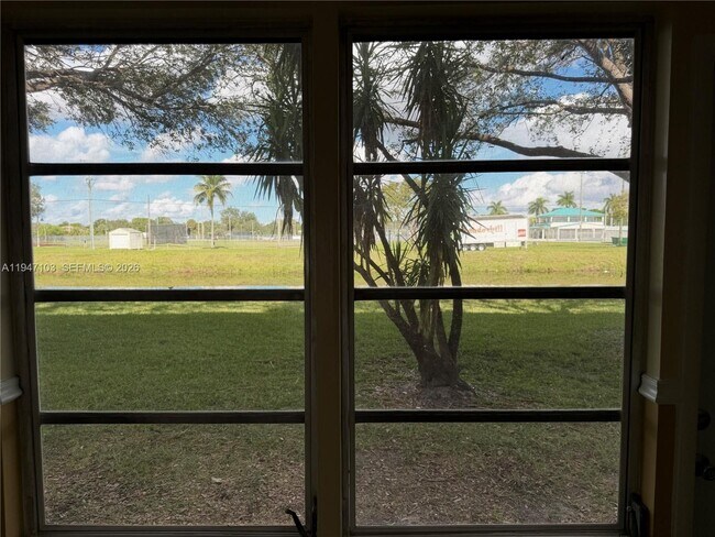 Building Photo - 7891 Sunrise Lakes Dr N