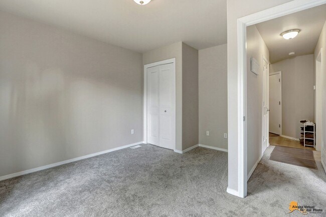 Building Photo - East Anchorage Home with Utilities Included!! Close to JBER! Attached Two Car Garage + Fenced in ...