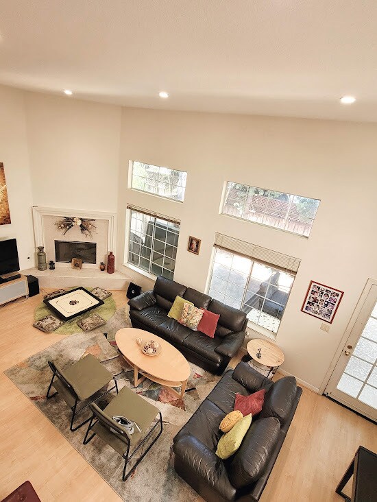 Living room with 20-foot ceiling with fire place - 2808 Cozumel Cir