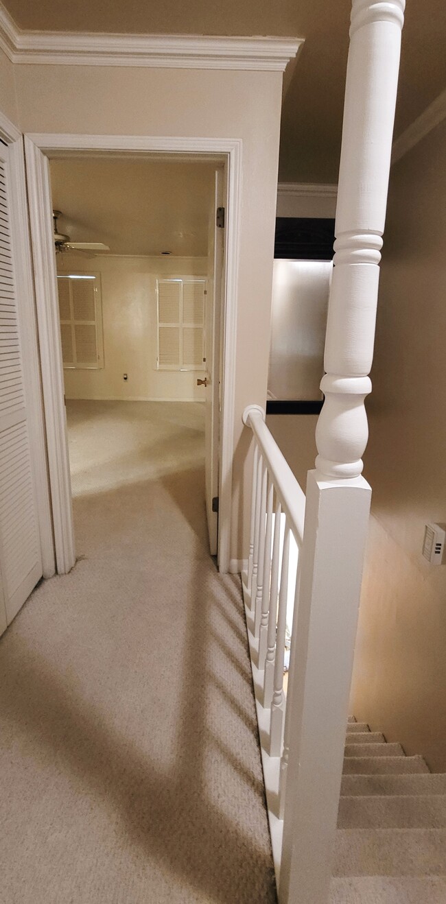 Entrance To The Main Bedroom (Washer and Dryer Closet To The Left/Staircase To The Right) - 416 Doucet Rd